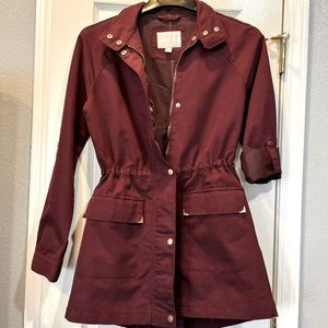 A New Day Maroon jacket with adjustable gathered waist.  Worn 1 time.  Size S
